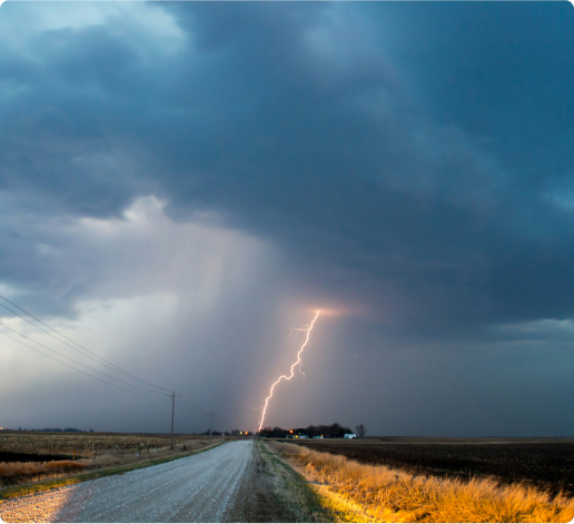 Road with a lightning strike at the end