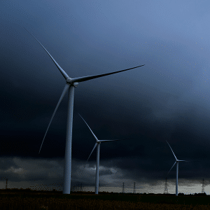 Wind turbine by thunderstorm.